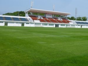 あきぎんスタジアム 300x225 - 鳥取県で開催されている大人（シニア向け）のサッカースクールご紹介