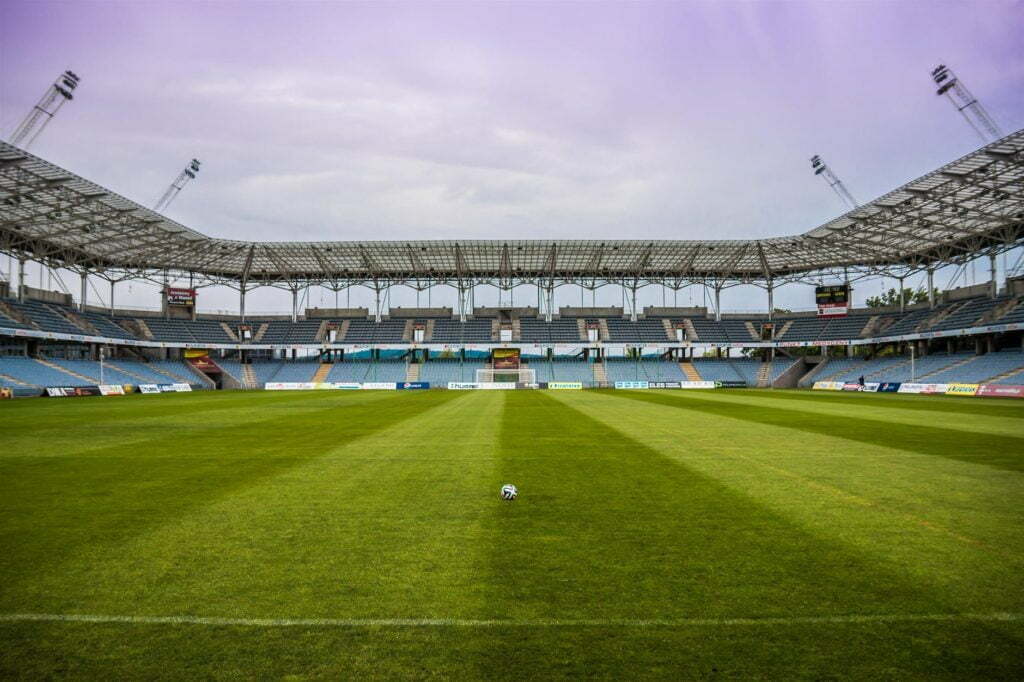 the-ball-stadion-football-the-pitch-46792 soccerball on wide green grass field