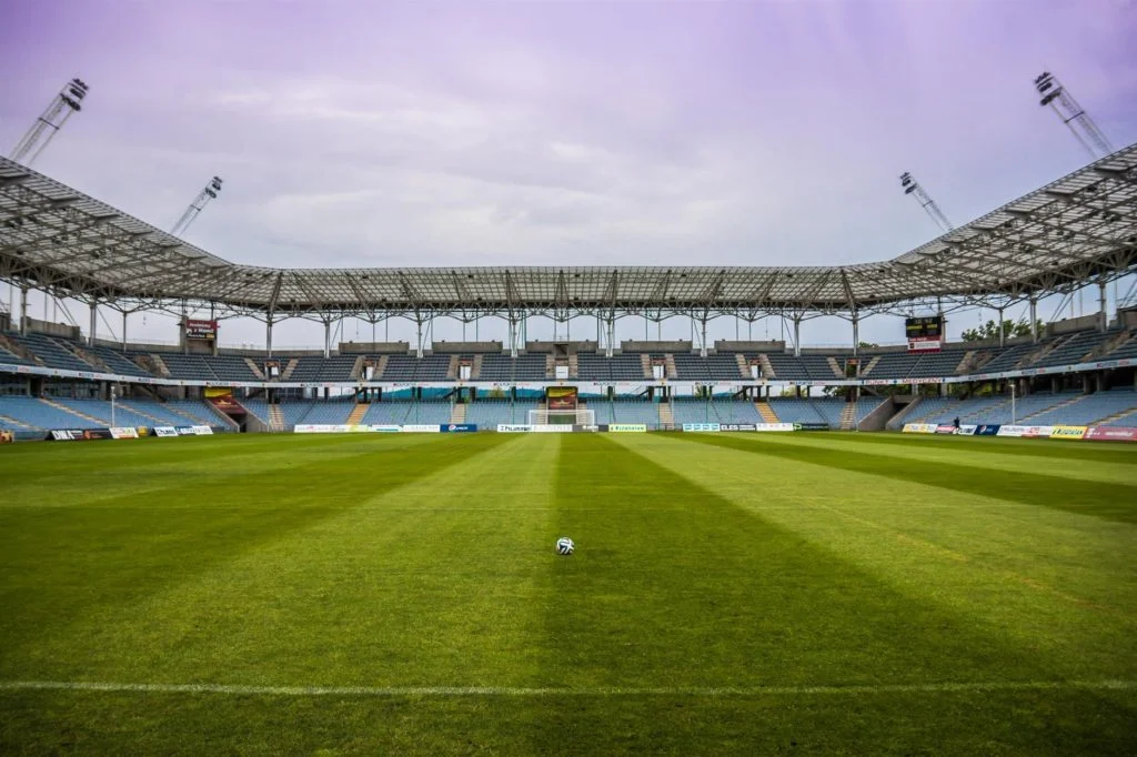 the-ball-stadion-football-the-pitch-46792 soccerball on wide green grass field
