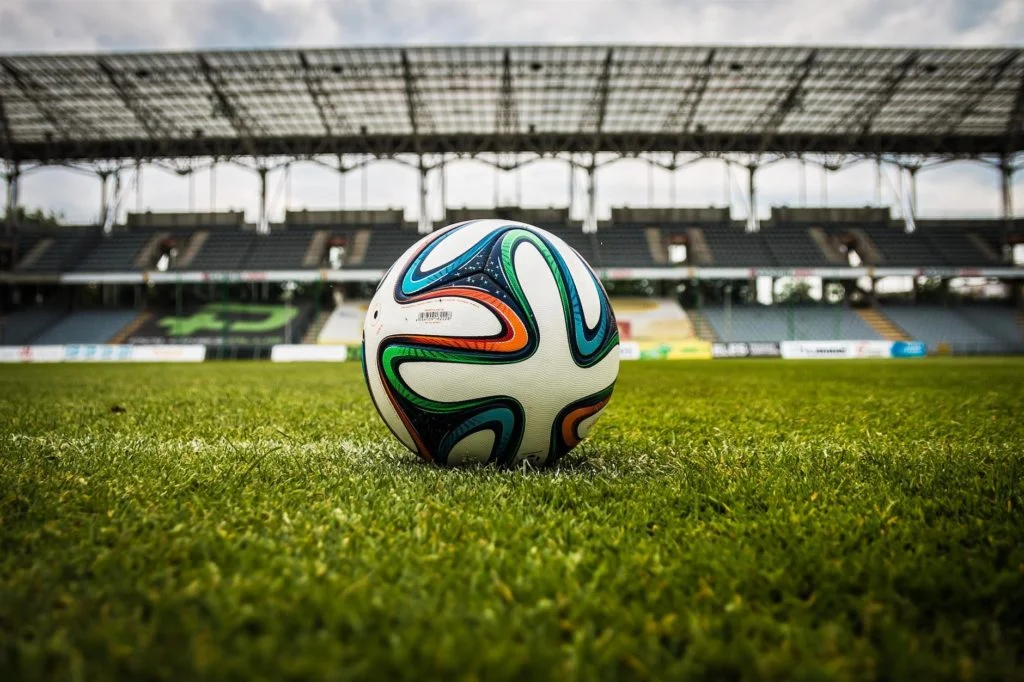 the-ball-stadion-football-the-pitch-47730 multicolored soccer ball on green field